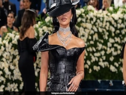 Kim Kardashian Takes On Met Gala 2025 In A Black Faux Leather Off-Shoulder Gown And Hat Kim Kardashian Takes On Met Gala 2025 In A Black Faux Leather Off-Shoulder Gown And Hat