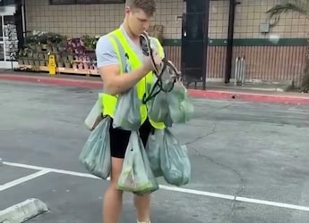 Man Hooks 9 Bags To His Vest To Carry Groceries, Internet Is Amazed By His Jugaad Man Hooks 9 Bags To His Vest To Carry Groceries, Internet Is Amazed By His Jugaad