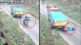 Video: Truck Rolls Back On Slope, Misses Woman On Scooter By Inches