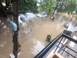 Waterlogging After Heavy Rain In Bengaluru, MLA Visits Affected Area On Bulldozer Waterlogging After Heavy Rain In Bengaluru, MLA Visits Affected Area On Bulldozer