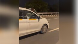 Video: Man Clings Onto Bonnet As Cab Driver Races Down Mumbai Road