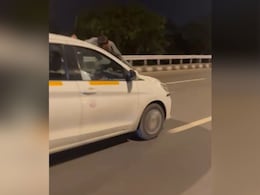 Video: Man Clings Onto Bonnet As Cab Driver Races Down Mumbai Road Video: Man Clings Onto Bonnet As Cab Driver Races Down Mumbai Road