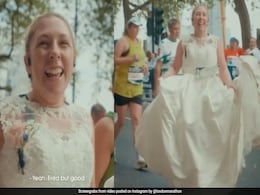 Why This UK Woman Ran A Marathon In Her Wedding Gown Why This UK Woman Ran A Marathon In Her Wedding Gown