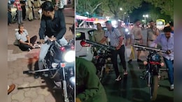 &lsquo;सहन कर पा रहे हो?&rsquo;  मोडिफाइड साइलेंसर लगाना पड़ा महंगा, युवकों को बुलेट के पास बैठाकर सुनाई आवाज