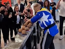 Man Smashes 48 Coconuts With One Hand While Blindfolded To Set A World Record Man Smashes 48 Coconuts With One Hand While Blindfolded To Set A World Record