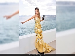 Natasha Poonawalla Shines Bright At Cannes 2025 In A Balenciaga Gold Foil Gown Natasha Poonawalla Shines Bright At Cannes 2025 In A Balenciaga Gold Foil Gown