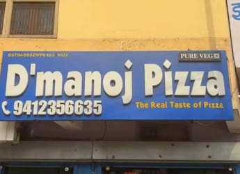 Hilarious Copycat Brand 'D'manoj Pizza' Goes Viral, Domino's Says... Hilarious Copycat Brand 'D'manoj Pizza' Goes Viral, Domino's Says...