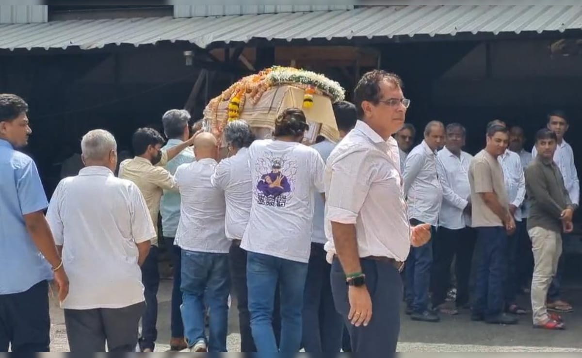 As the funeral procession found its way to the cremation ground, heads bowed and silence descended once more. As the funeral procession found its way to the cremation ground, heads bowed and silence descended once more.