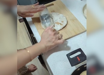 Indian Mom Uses Beer Bottle As Rolling Pin, Internet Loves The Jugaad Indian Mom Uses Beer Bottle As Rolling Pin, Internet Loves The Jugaad
