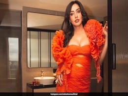 Neha Sharma Adds A Pop Of Vibrant Orange To Her Summer Closet In A Cutout Gown Neha Sharma Adds A Pop Of Vibrant Orange To Her Summer Closet In A Cutout Gown