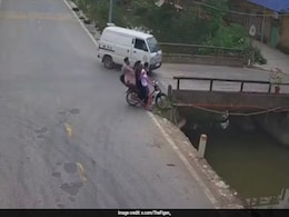 On Camera, Narrow Escape For Pillion As Bike Crashes Into Stream On Camera, Narrow Escape For Pillion As Bike Crashes Into Stream