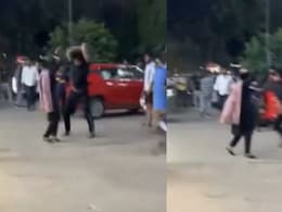 Man Hits Woman With Stick In Ghaziabad After She Fights With His Girlfriend Man Hits Woman With Stick In Ghaziabad After She Fights With His Girlfriend