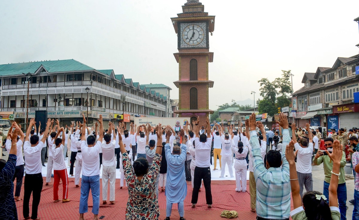 People seen during the yoga session at Srinagars Ghanta Ghar