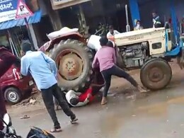 Video: Driver Runs Tractor Over 2 Men During Fight In Karnataka, They Survive Video: Driver Runs Tractor Over 2 Men During Fight In Karnataka, They Survive