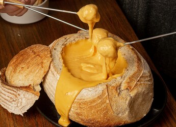 How To Make Cheese Fondue At Home For An Unforgettable Dinner Party How To Make Cheese Fondue At Home For An Unforgettable Dinner Party