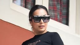 Malaika Arora Looks Street Style Chic In A Black Crop Top And Track Pants
