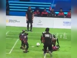 Video: Fist-Pumping Humanoid Robots Play Football Badly in Beijing Video: Fist-Pumping Humanoid Robots Play Football Badly in Beijing