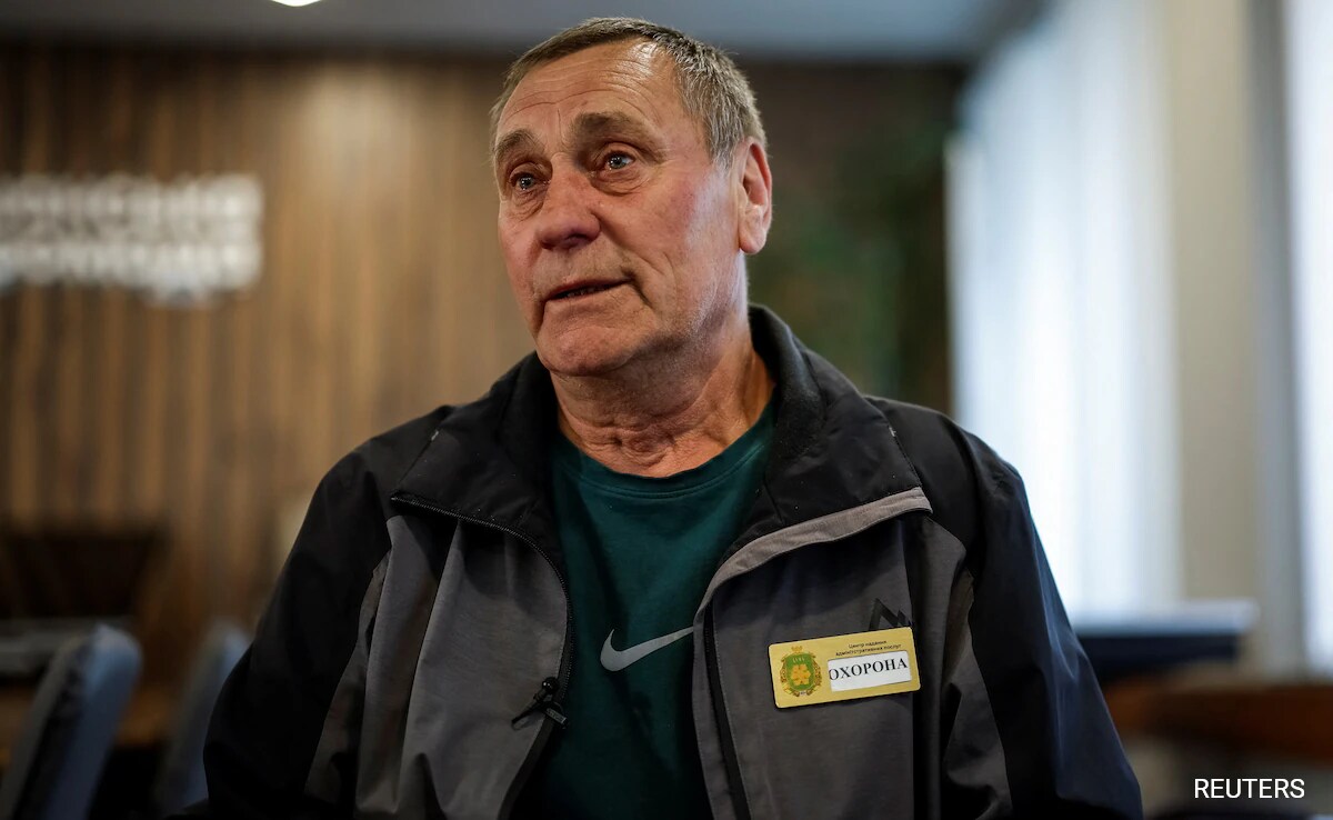 Bucha Украйна Volododymyr Umanets 69 годишен охранител се надява че синът