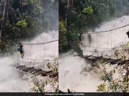 Video: Man Tries To Cross Hanging Bridge Amid Floods. Kiren Rijiju Reacts Video: Man Tries To Cross Hanging Bridge Amid Floods. Kiren Rijiju Reacts