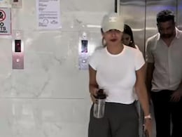 Take Notes From Malaika Arora To Set Street Style Goals In A White Tee With Cargo Pants