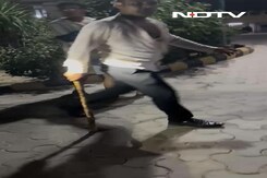 Video: Guards Beat Residents With Sticks Over Power Outage Complaint In Greater Noida Video: Guards Beat Residents With Sticks Over Power Outage Complaint In Greater Noida