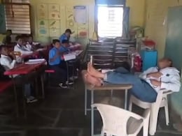 Video: Maharashtra Teacher Naps, Snores For 30 Minutes In Class Full Of Children Video: Maharashtra Teacher Naps, Snores For 30 Minutes In Class Full Of Children