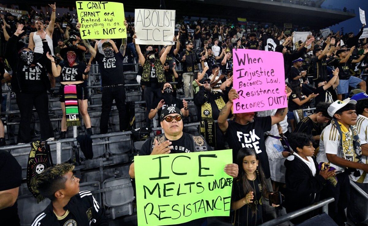 Fans hold up protest signs in the stands after the game between Sporting Kansas City and Los Angeles FC at BMO Stadium (Source: AFP) Fans hold up protest signs in the stands after the game between Sporting Kansas City and Los Angeles FC at BMO Stadium (Source: AFP)