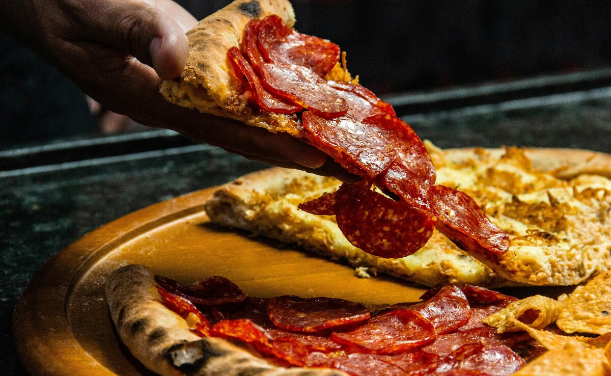 A simple trip to the pizza place turned into a life-changing moment for this couple. A simple trip to the pizza place turned into a life-changing moment for this couple.