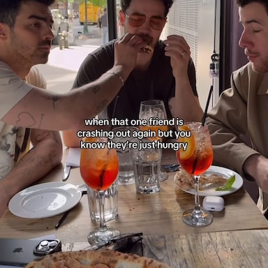 Watch: Jonas Brothers' Hilarious Foodie Moment Is Too Relatable To Miss