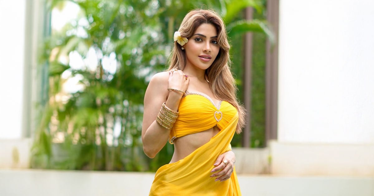Nikki Tamboli Illuminates Fashion with Radiant Yellow Saree