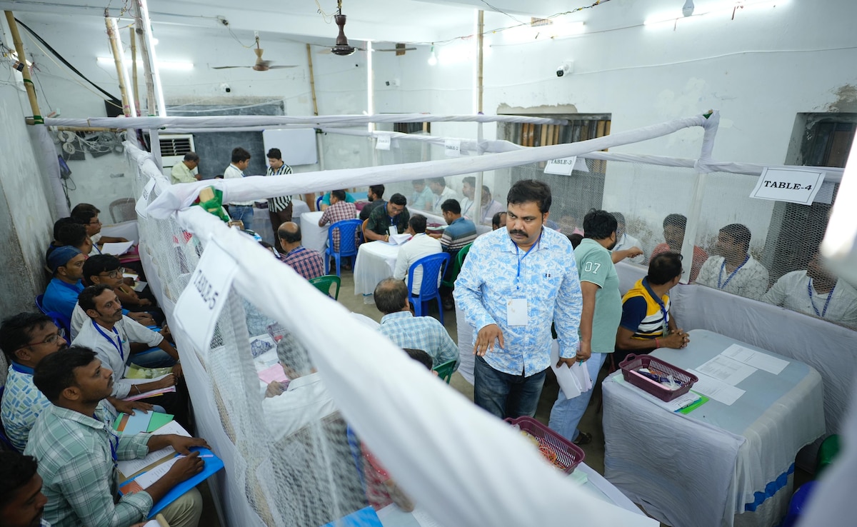 Officials and counting agents inside the counting hall as votes are being counted for by-election to 5 seats. 