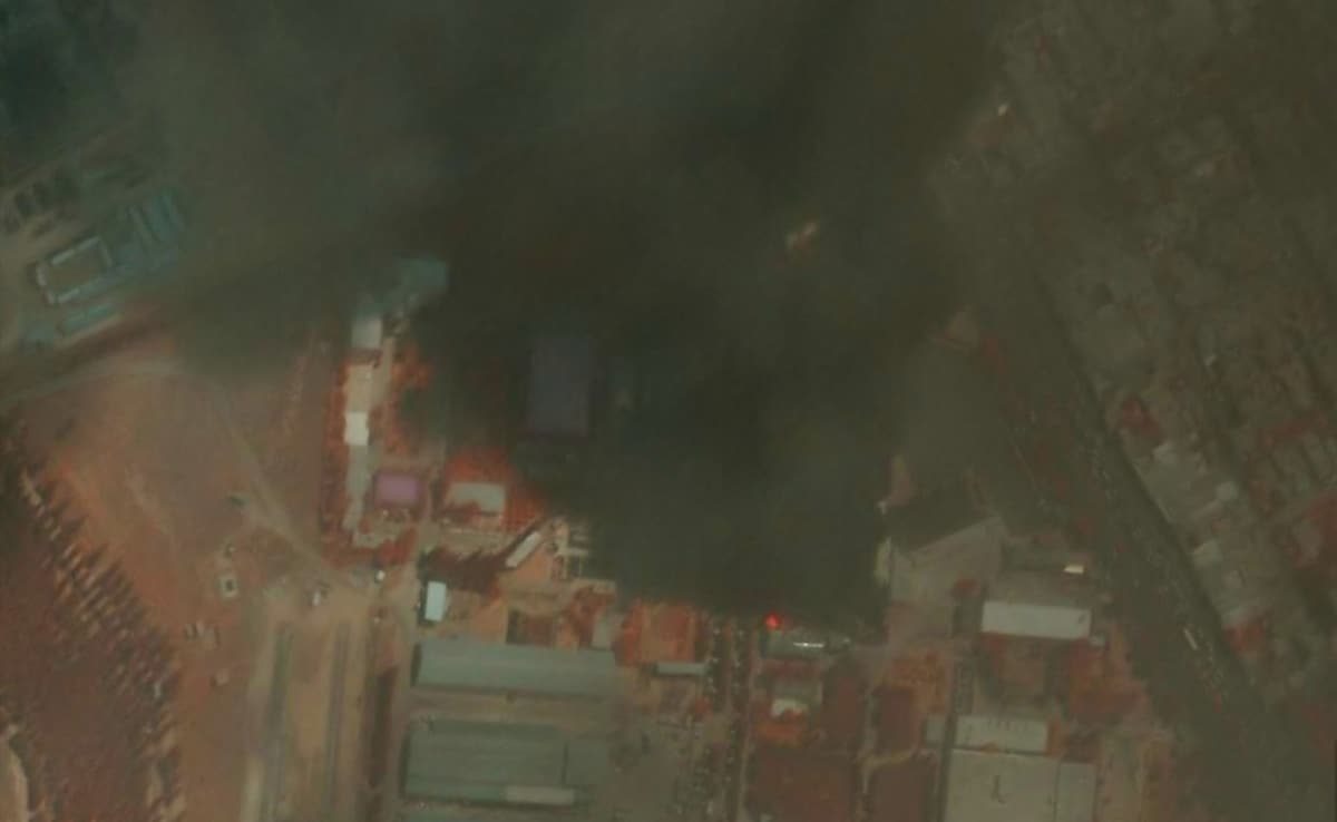 Image showsburning buildings at Shiraz Electronics Production Facility | See hi-res image here