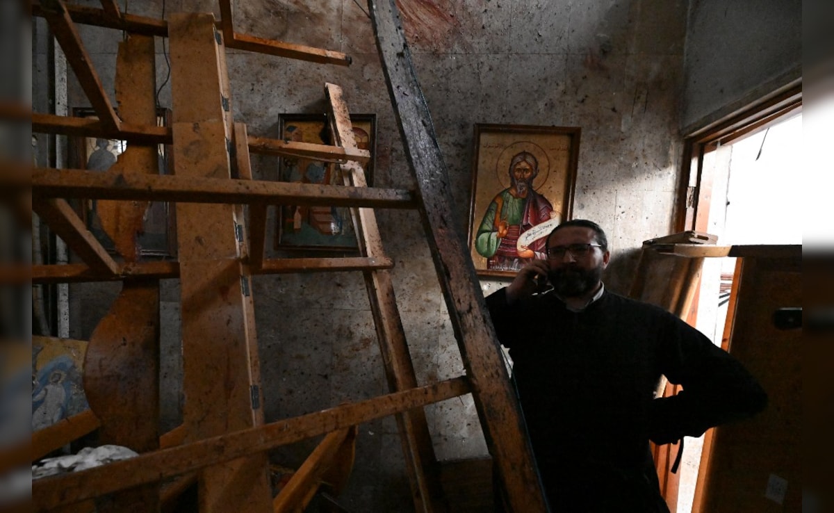 The church caught fire and the remains of wooden benches thrown all the way to the entrance. 