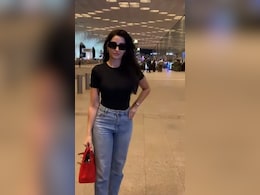 Nora Fatehi Serves Airport Fashion Goals In A Classic Black Tee And Blue Jeans Nora Fatehi Serves Airport Fashion Goals In A Classic Black Tee And Blue Jeans
