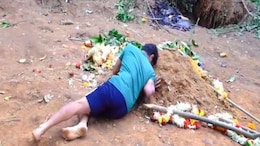 "I Want To Stay Here Too": Father Holds On To Grave Of Son Killed In Stampede
