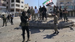 Syrians Find Bodies In Streets While Searching For Loved Ones Amid Clashes