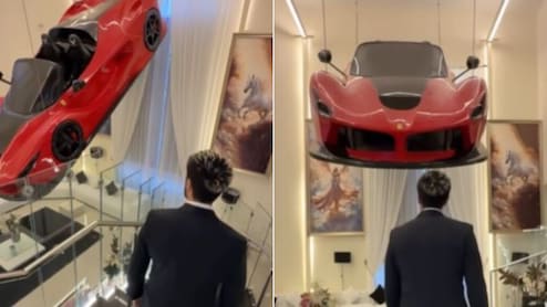 शौक या दिखावा ! लिविंग रूम में झूमर की जगह लटका दी लाल Ferrari कार, Video देख यूजर्स बोले- ये क्या बकवास है