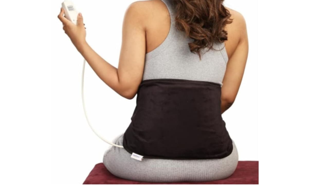 Heating Pad; plugs into your waistline and switches on spinal relief. 