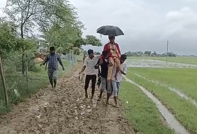 Bride Walks Through Mud, Groom Carried On Shoulders In Village Without Road