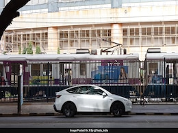 Elon Musk's Tesla Debuts in Mumbai, Model Y Seen Near Local Train Elon Musk's Tesla Debuts in Mumbai, Model Y Seen Near Local Train