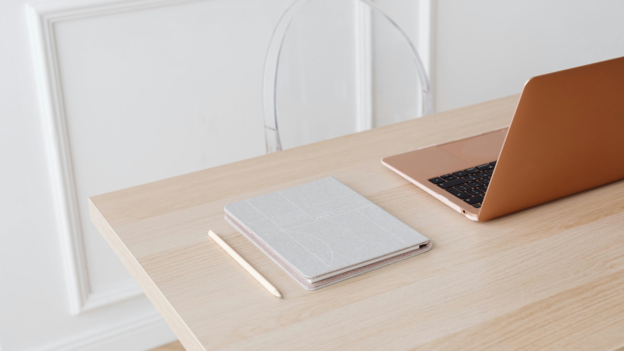 Minimal Desk, Maximum Utility: A sleek setup that complements a smart, portable laptop table.