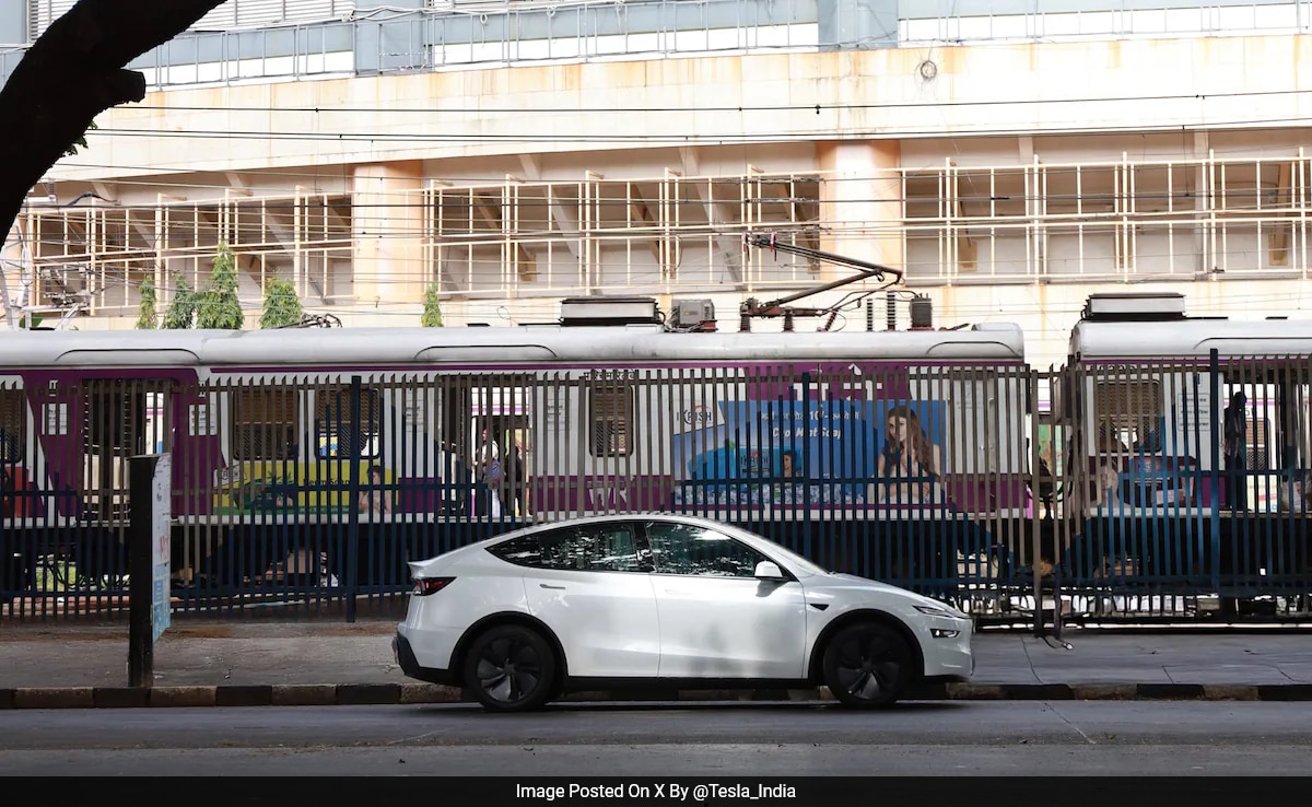 Elon Musk's Tesla Debuts in Mumbai, Model Y Seen Near Local Train