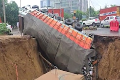Gurugram Road Caves In, Truck Falls Into Giant Crater After Heavy Rain Gurugram Road Caves In, Truck Falls Into Giant Crater After Heavy Rain