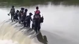 Video: With No Bridge, Children Cross Gushing River Daily To Attend School