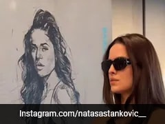 Natasa Stankovic's Balancing Pose On Stacked Weights Is As Difficult As It Looks