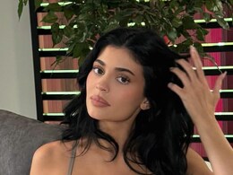 Kylie Jenner Turns Up The Heat In A Silver Latex Tank Top And Maxi Skirt Kylie Jenner Turns Up The Heat In A Silver Latex Tank Top And Maxi Skirt