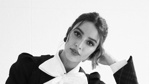 Triptii Dimri Nails The Corpcore Trend In A Bow Blazer And Check Skirt
