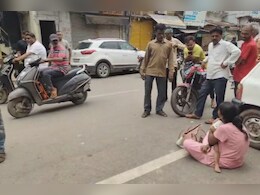 High Voltage Drama: गोद में बच्ची और हाथ में कीटनाशक... बीच सड़क बैठी महिला, जानें - पूरा मामला High Voltage Drama: गोद में बच्ची और हाथ में कीटनाशक... बीच सड़क बैठी महिला, जानें - पूरा मामला