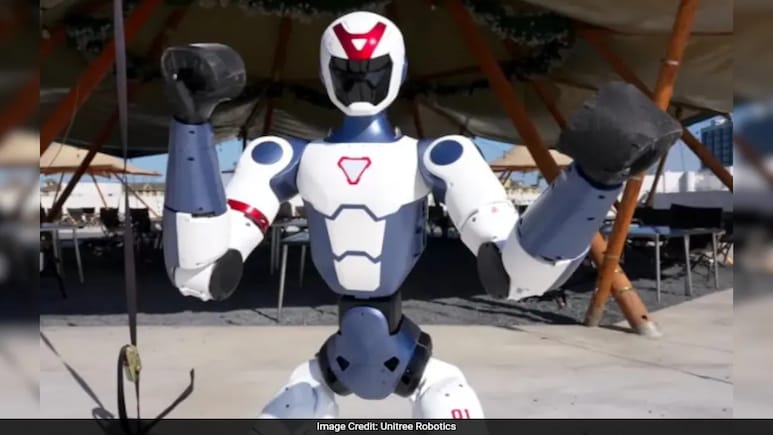Rivalling Musk's Optimus Robot, China Unveils Rs 5 Lakh Bot That Can Fist-Fight Rivalling Musk's Optimus Robot, China Unveils Rs 5 Lakh Bot That Can Fist-Fight