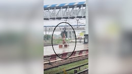 Elderly Man Spotted Doing Yoga In Rain On Railway Platform, Internet Calls It "Aura Farming"